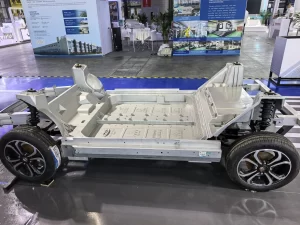 High-pressure die cast structural frame for electric vehicles