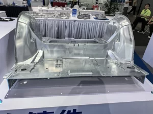 High-volume die cast base frame for electric vehicles